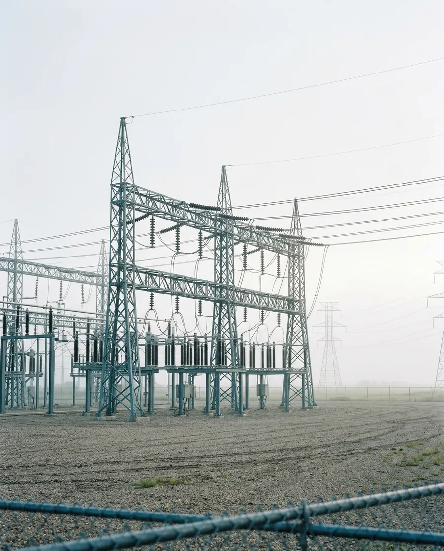 Electrical substation in morning mist